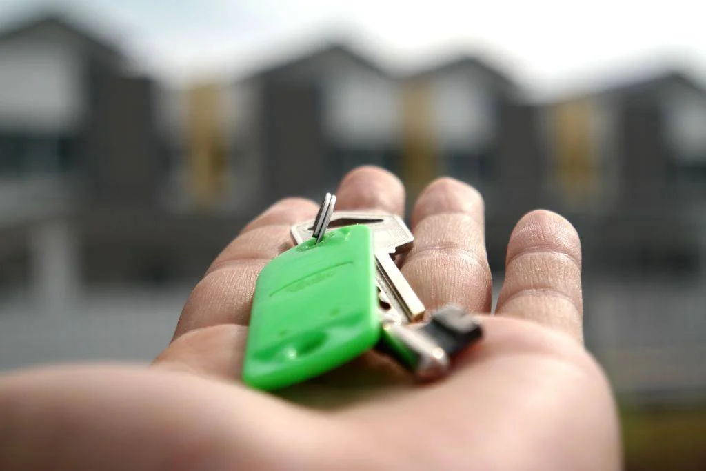 Tenancy-ready training hand holding keys